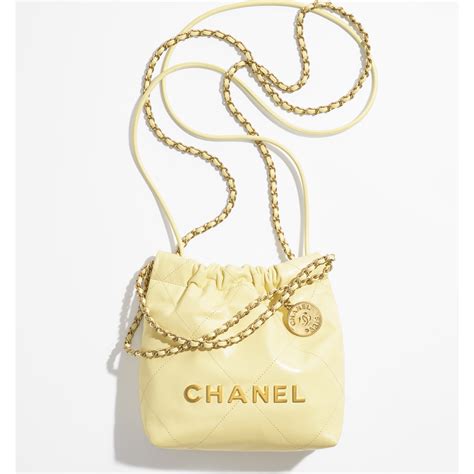 bolso mini chanel 22|CHANEL 22 Mini HandbagShiny Calfskin & Gold.